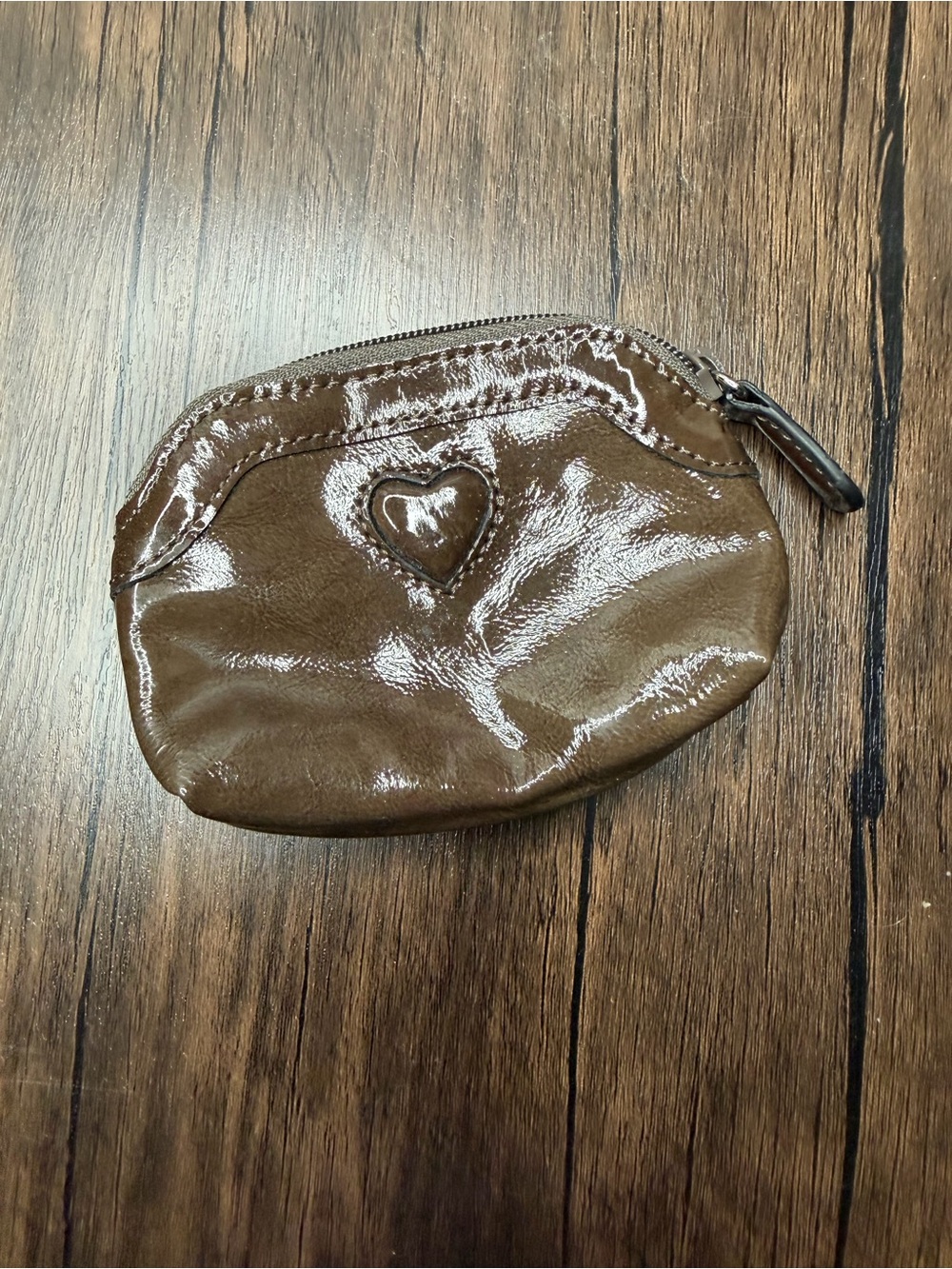 Brighton's Brown Leather Domed Shaped Coin Purse with zipper closure.